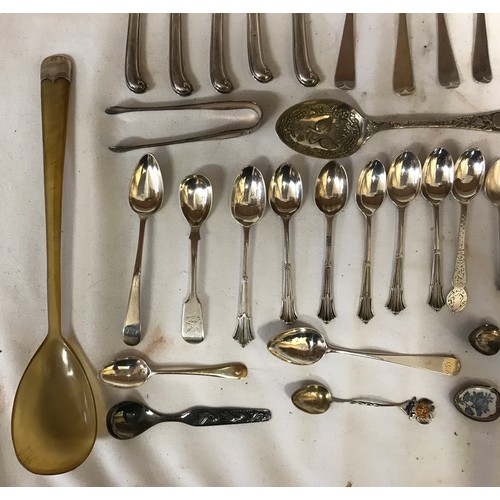 708 - A large collection of silver cutlery mainly Sheffield. Butter knives with EPNS blade but silver hand... 