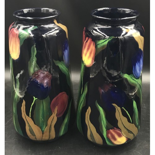 370 - A pair of Royal Stanleyware 'Jacobean' tall vases decorated with tulips on a dark blue ground, 30.5 ... 