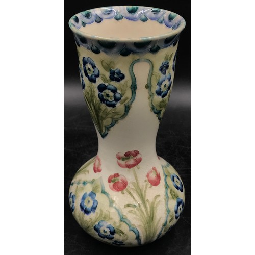 376 - A William Moorcroft Macintyre Burslem vase with floral design 21 h and a pair of hand painted hollow... 