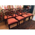 Ten mahogany balloon back dining chairs with red and gold upholstery  83cm h to back 45cm h to seat.