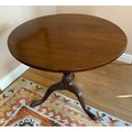 A 19thC mahogany circular tiptop table 80 d x 72.5cm.
