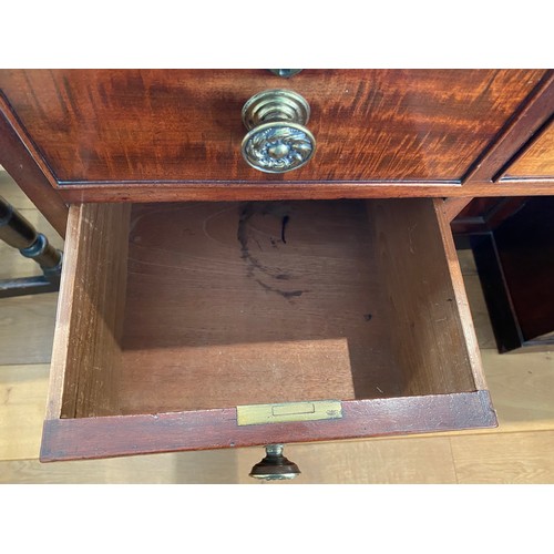 43 - A 19thC mahogany kneehole desk with brass knobs and central cupboard 108 w x 52 d x 85cm h.