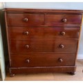 A 19thC mahogany chest of drawers two short over three long on bun feet 122 w x 116 h x 51cm d.