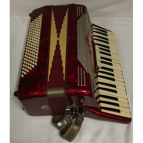 1158 - A Pigliacampo piano accordion with Bandon and Clarinet tone selection, cased made in Italy.