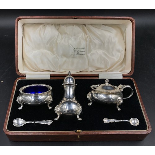 701 - Silver cruet set to include salt, pepper and mustard pots London 1938 together with two spoons One B... 