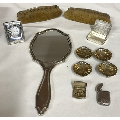 700 - A silver backed hand mirror by Synyer & Beddoes dated 1921, 2 clothes brushes marked A. Barraclough ... 