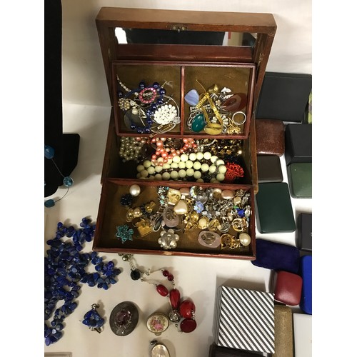 464 - A selection of costume jewellery to include necklaces, earrings, brooches etc along with a collectio... 