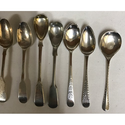 703 - Fourteen hallmarked silver spoons to include 5 matching fiddle pattern teaspoons Exeter 1881, 3 old ... 