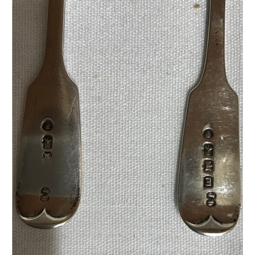 703 - Fourteen hallmarked silver spoons to include 5 matching fiddle pattern teaspoons Exeter 1881, 3 old ... 