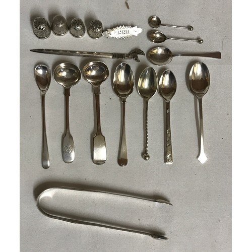 704 - A collection of silver items to include Georgian tongs hallmarked 1790 Exeter Josheph Hicks, 4x thim... 