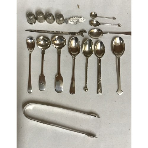 704 - A collection of silver items to include Georgian tongs hallmarked 1790 Exeter Josheph Hicks, 4x thim... 