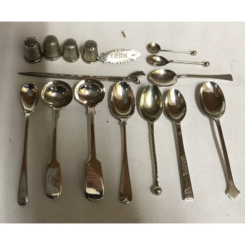 704 - A collection of silver items to include Georgian tongs hallmarked 1790 Exeter Josheph Hicks, 4x thim... 