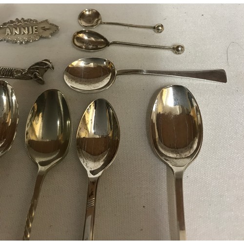 704 - A collection of silver items to include Georgian tongs hallmarked 1790 Exeter Josheph Hicks, 4x thim... 