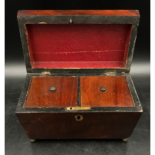 1005 - A mahogany sarcophagus caddy with key and two interior lidded compartments on ball feet. 13 d x 22.5... 