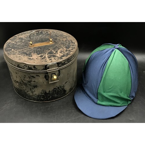 A Charles and Owen young riders jockey hat along with a Metal