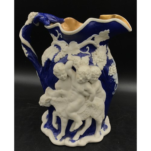 366 - A 19thC Minton Bacchanalian Jug of large proportions, in blue glaze moulded with figures of Silenus ... 