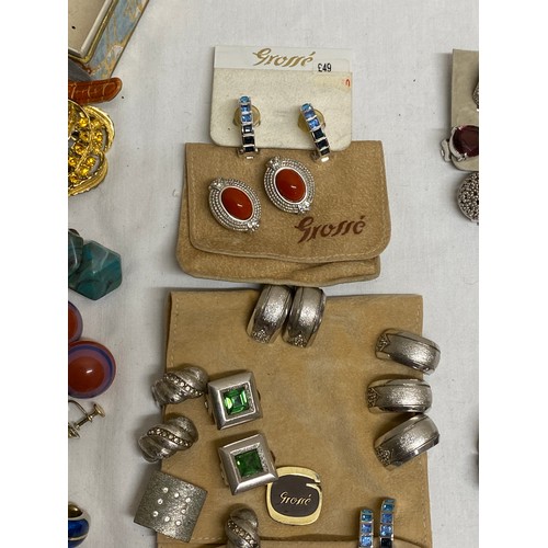 465 - A collection of mainly vintage costume jewellery. Clip on earrings to include seven pairs of Grosse,... 