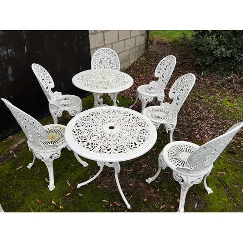 184 - Two metal garden tables and 6 chairs. Tables 69cm d.