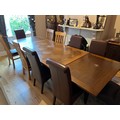 A good quality continental oak large extending dining table. 180 w x 115 d x 74cm h (closed) 148cm w... 