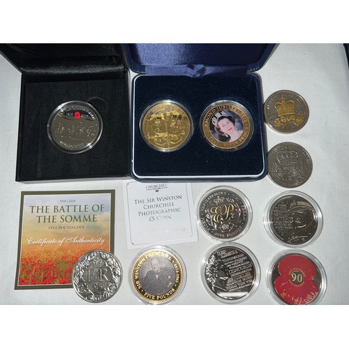 632 - A collection of 9 five pound coins to include Lest We Forget, Elizabeth II Coronation, Winston Churc... 