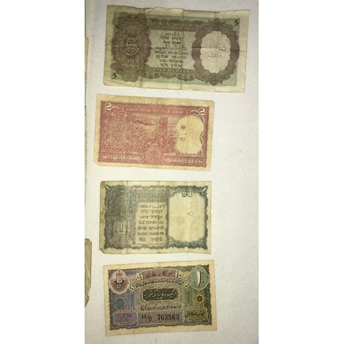 629 - A collection of world banknotes 37 in total to include India: 1 Rupee liaquat jung, 1 rupee note 194... 