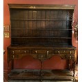 A part late 18thC oak dresser, 6 drawers to base and shelved back. 179 w x 40 d x 204cm h. Ivory dec... 