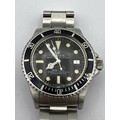 A Rolex Sea-Dweller Submariner 2000 - Double Red - Reference: 1665 from 1978. The dial features the ... 
