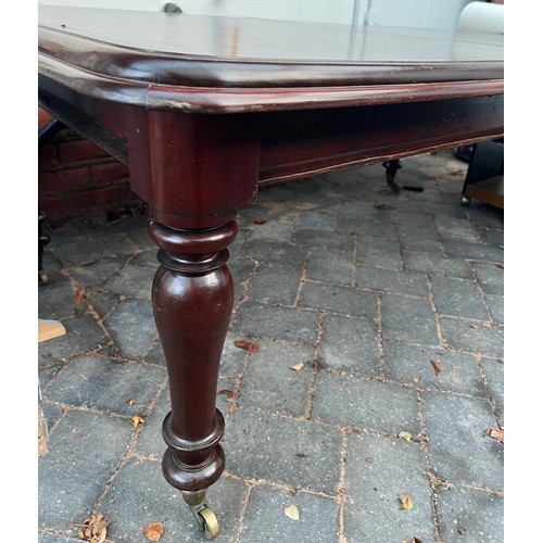 9 - A 19thC mahogany wind out extending dining table. 182cm without leaves. 289cm with leaves.
