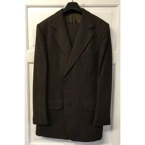 937 - A 1970's Christian Dior suit. 50cm underarm to underarm.