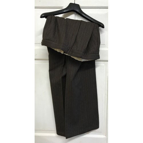 937 - A 1970's Christian Dior suit. 50cm underarm to underarm.