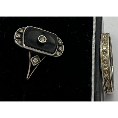 495 - Two vintage 9 carat gold rings, one with silver and black stone.