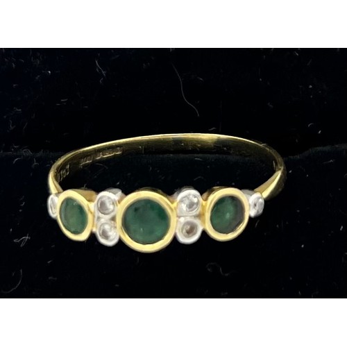 494 - Eighteen carat gold ring set with emeralds and diamonds. Size Q. Weight 2g.