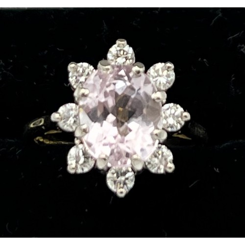 589 - Eighteen carat kunzite and diamond cluster ring.