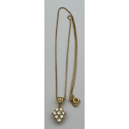 588 - Diamond set pendant on 18 carat gold chain. Length 40cm.