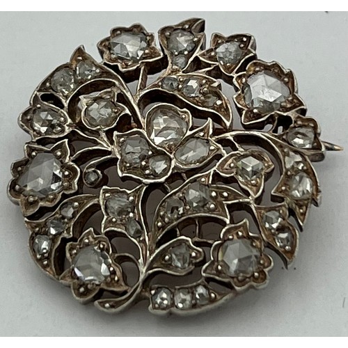 499 - A late 19th/early 20th century circular brooch set with old cut diamonds. Total weight 6.9g. 2.5cm d... 