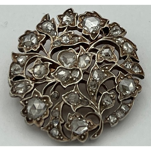 499 - A late 19th/early 20th century circular brooch set with old cut diamonds. Total weight 6.9g. 2.5cm d... 