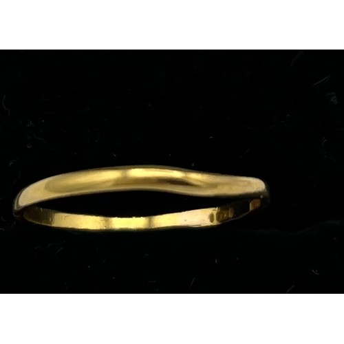 609 - Wedding band tests as 22 carat gold. 1.3gm.