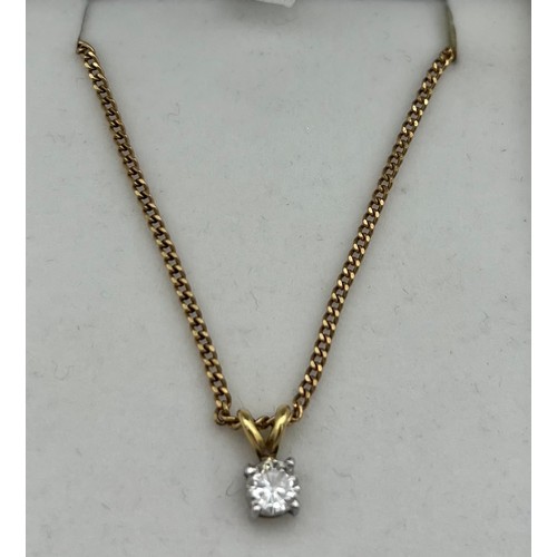 503 - Diamond drop pendant set in 18 carat gold  on 9 carat gold chain, 40cm long.