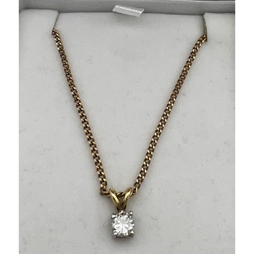 503 - Diamond drop pendant set in 18 carat gold  on 9 carat gold chain, 40cm long.