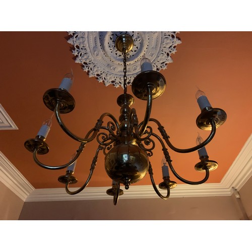 1127 - Good quality eight branch brass chandelier. 30