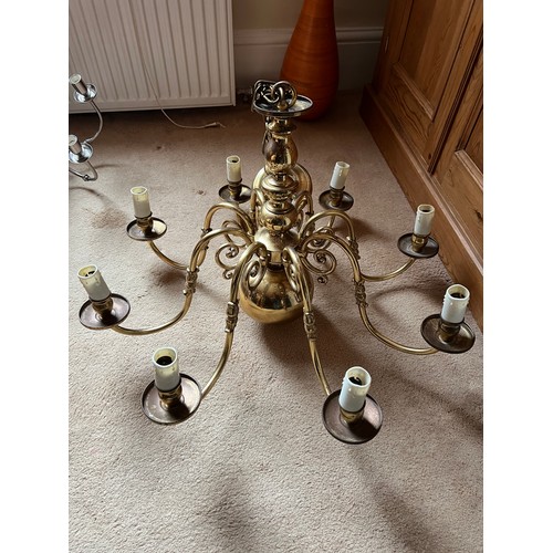 1127 - Good quality eight branch brass chandelier. 30