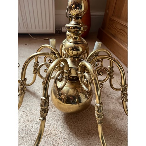 1127 - Good quality eight branch brass chandelier. 30