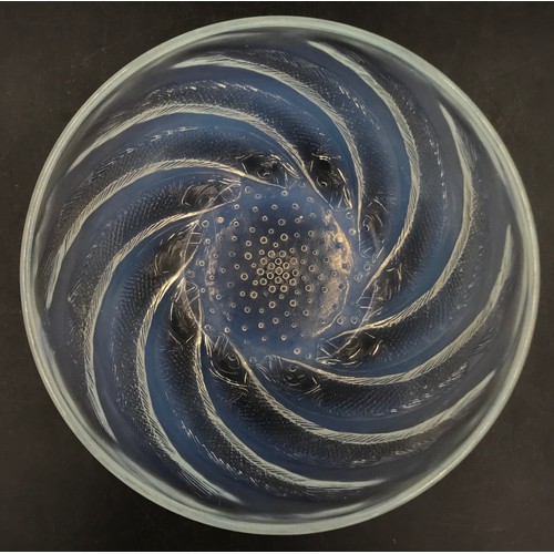 440 - A Lalique 'Poissons' opalescent glass dish,
moulded with fish, etched mark 'R. Lalique France'. No 3... 