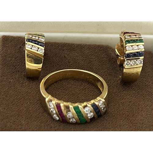 507 - An 18 carat gold ring set with diamonds sapphires, emeralds and rubies with a pair of matching earri... 