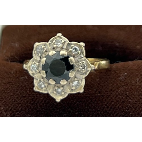 509 - Eighteen carat gold diamond and sapphire cluster ring. Size L. Weight 4.2gm.