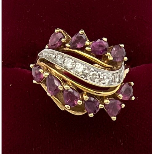 505 - A 14 carat yellow gold ring set with pink and white gem stones. Size K. Weight 5.7gm.