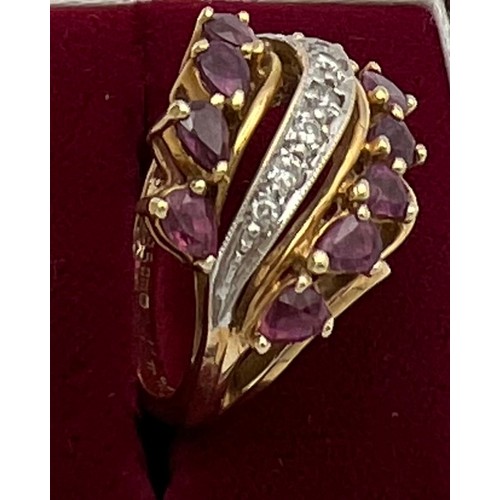 505 - A 14 carat yellow gold ring set with pink and white gem stones. Size K. Weight 5.7gm.