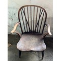 A 19thC elm chair.