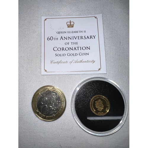 634 - A Commonwealth Games 2002 two pound coin with Queen Elizabeth II 60th Anniversary of the Coronation ... 