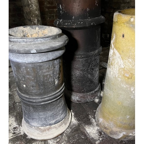 200 - Four various Chimney Pots tallest 75cm h